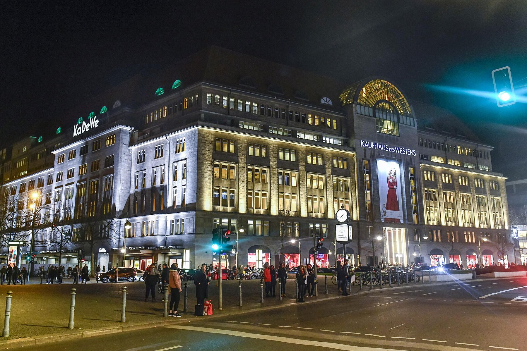 The department store of the West brightly lit at night. 