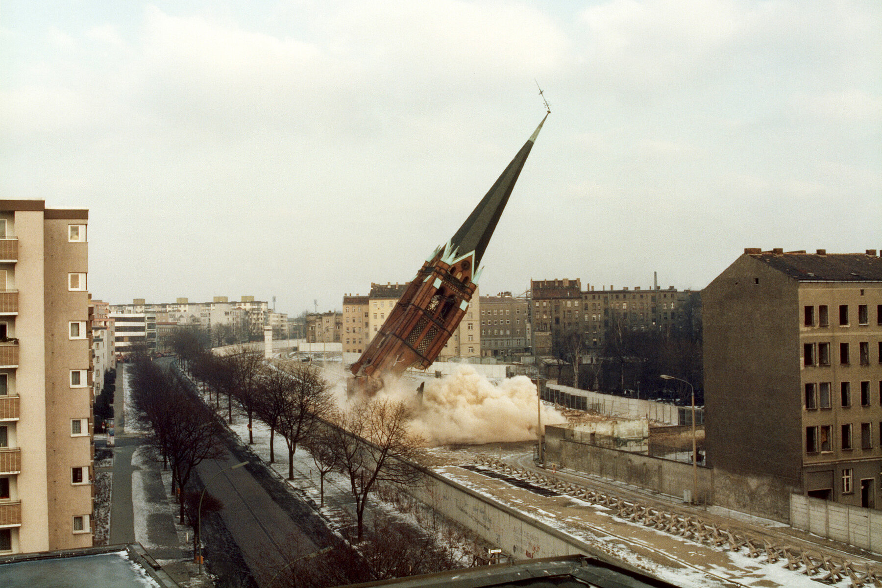 The tower of the Church of Reconciliation tilts to the right into the Wall strip when it is blown up.