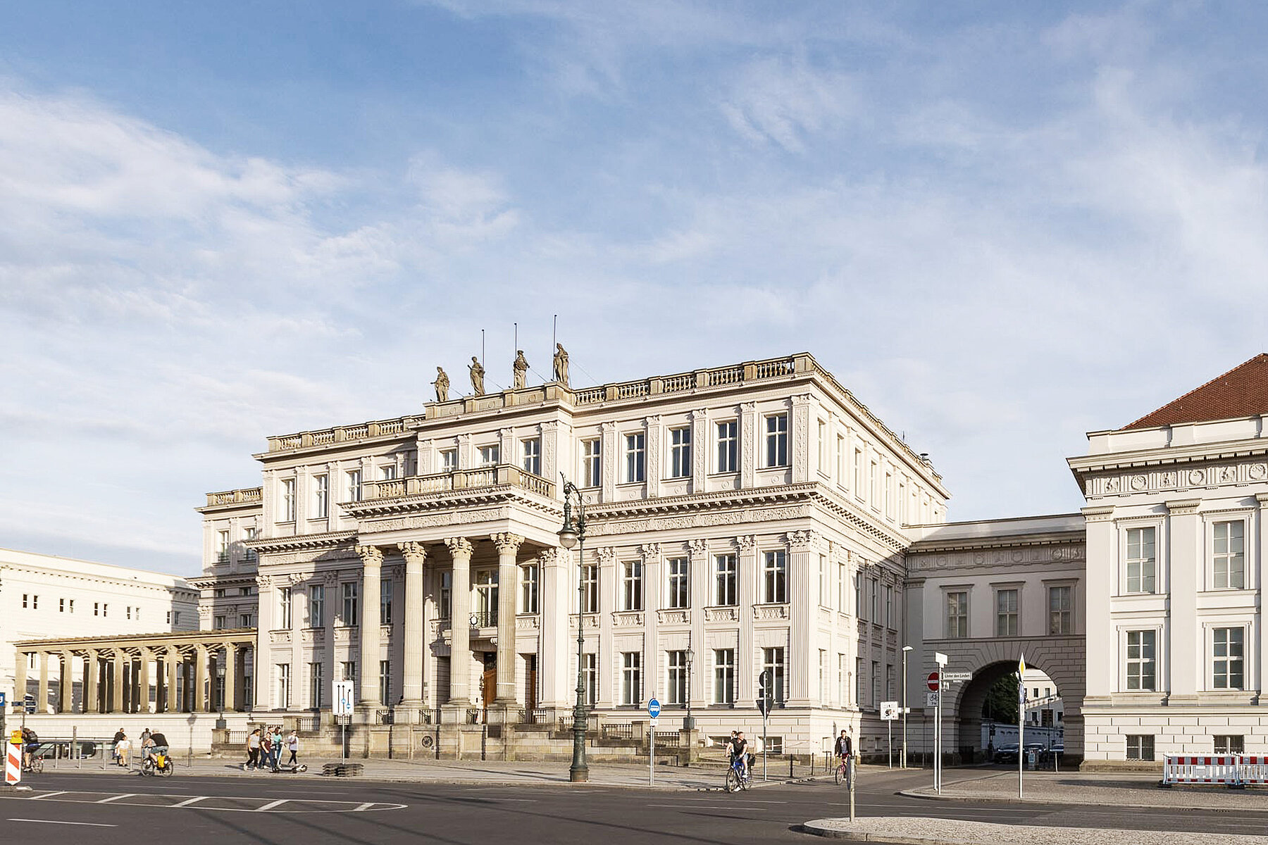 A view of the classicist Crown Prince's Palace. In front of it is the empty boulevard Unter den Linden.