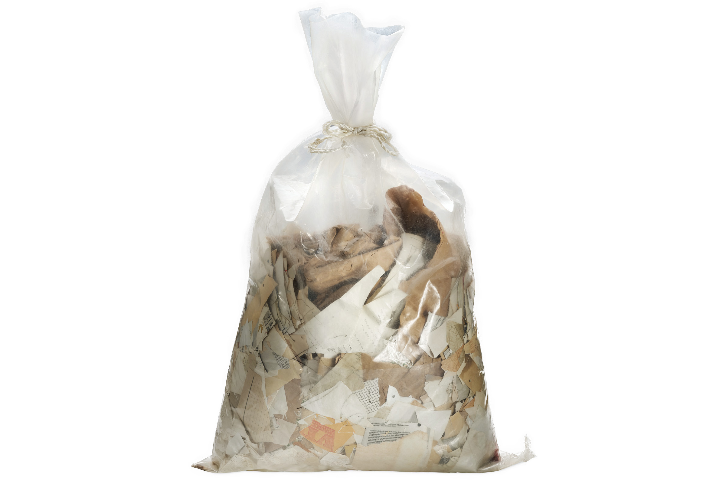 A transparent plastic sack with snippets of paper.